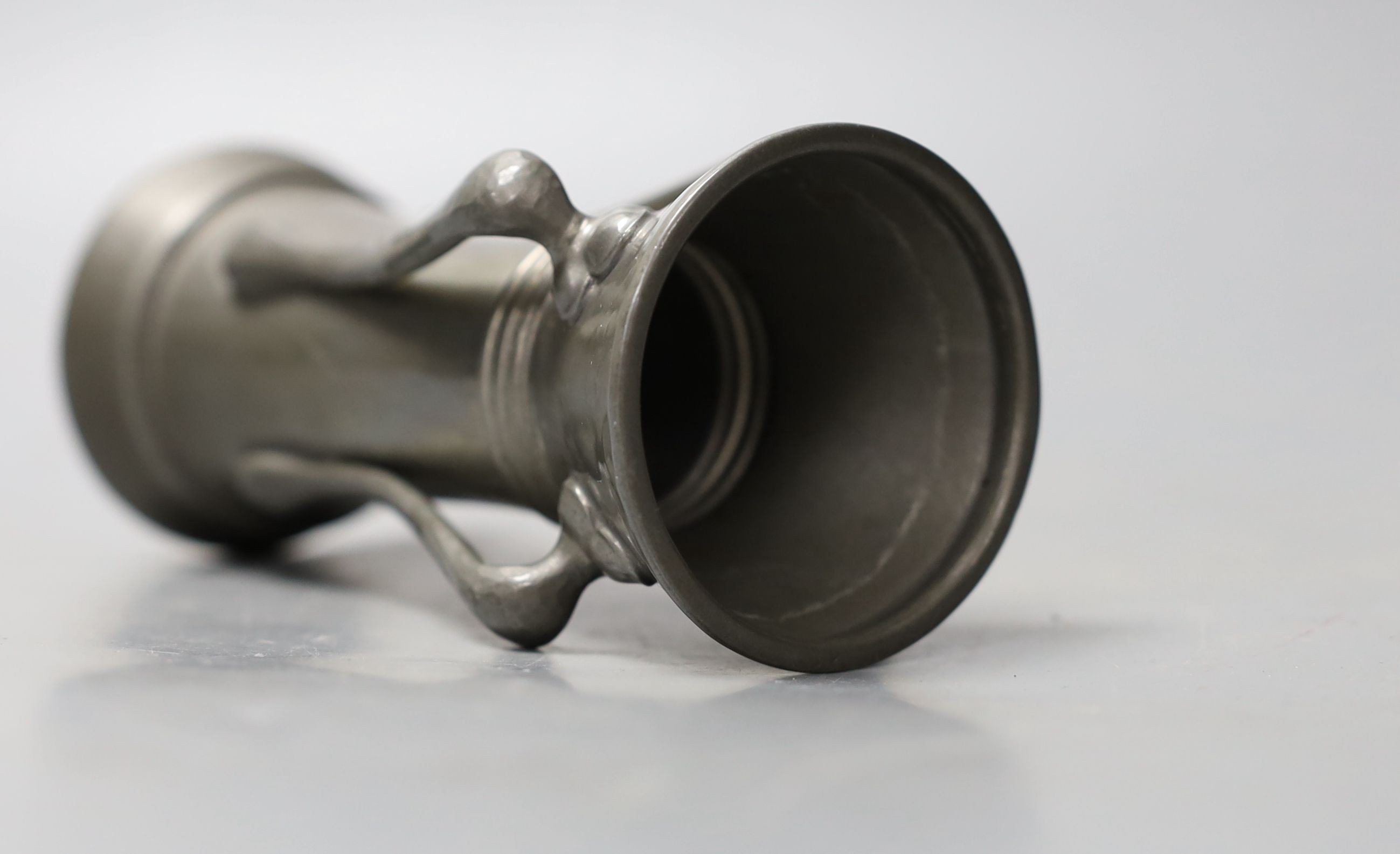 A Liberty’s Tudric pewter four-handled vase designed by Archibald Knox, shape 01214, 14cm. *This lot is being sold in aid of Prostate Cancer UK with 100% of the hammer price going to the charity”